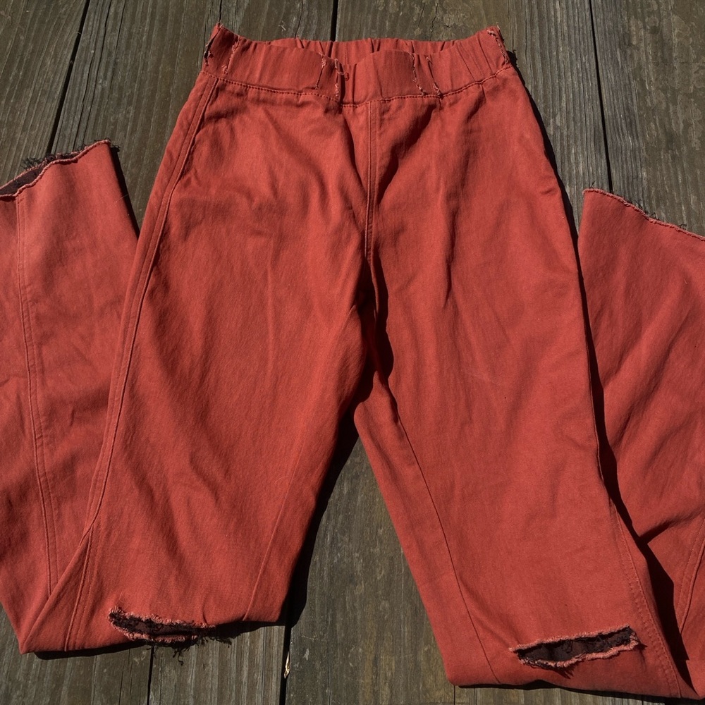 Womens rust colored flare jeans